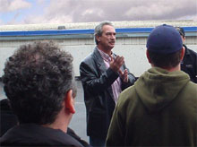 Brendan Kapuscinski speaks 
to a 
group of attentive students